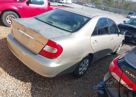 2003 Toyota Camry Le z USA, uszkodzony, nr VIN 4T1BE32K33U184725